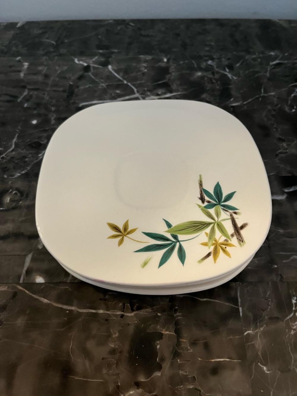 Four Vintage Salem China Company saucers in the "Woodland" or "Woodhue" pattern